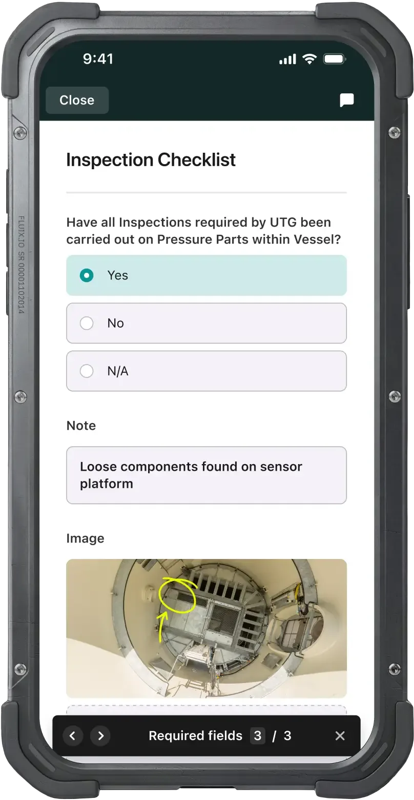 Phone screen of an Inspection Checklist with Yes/No/N-A options, a note, a photo with a hand-drawn circle and a required-fields counter