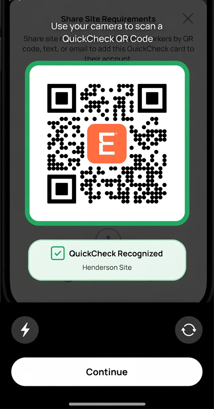 Phone screen with a QR code in a green frame and a message that a QuickCheck was recognised for a named site